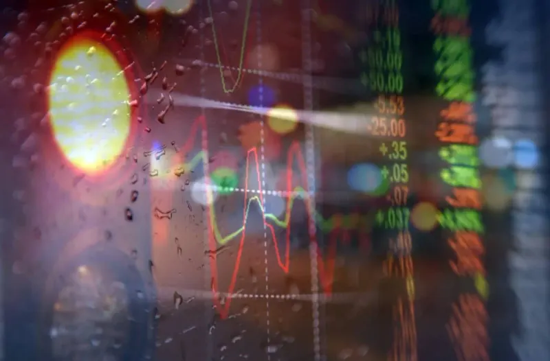A luminous silicon bridge cracks under heat and heavy weights, symbolizing pressure on the AI investment boom.