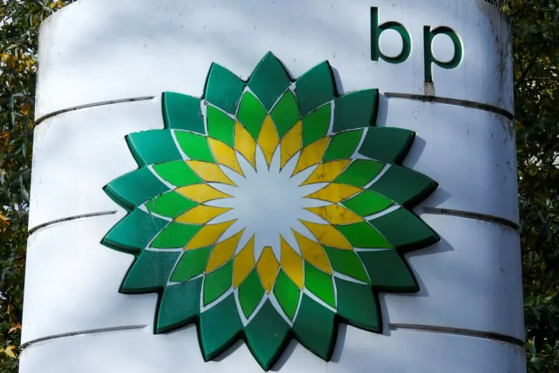 A tarnished oil barrel springs toward polished barrels ahead, symbolizing BP's buy call after years of lagging rivals.