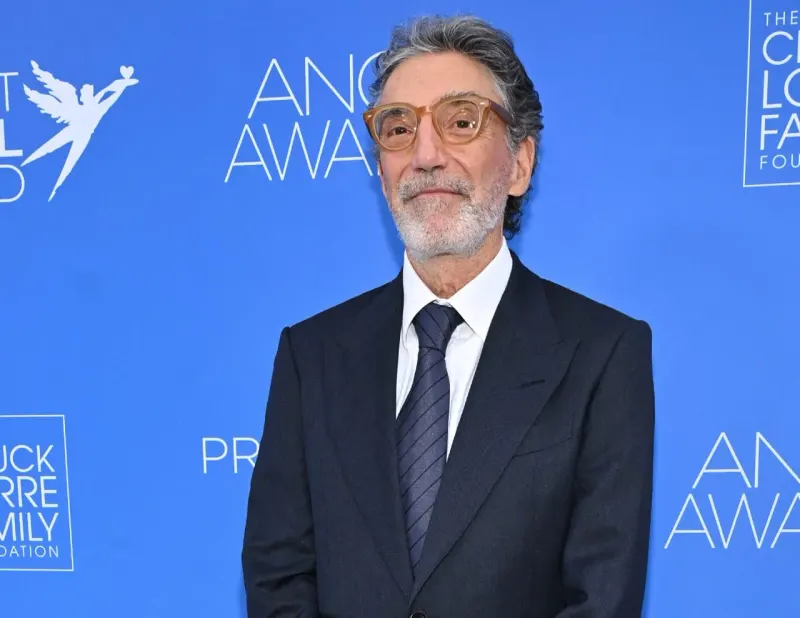 An open memoir transforms into luxury homes, connecting Chuck Lorre’s television career with his real estate portfolio.