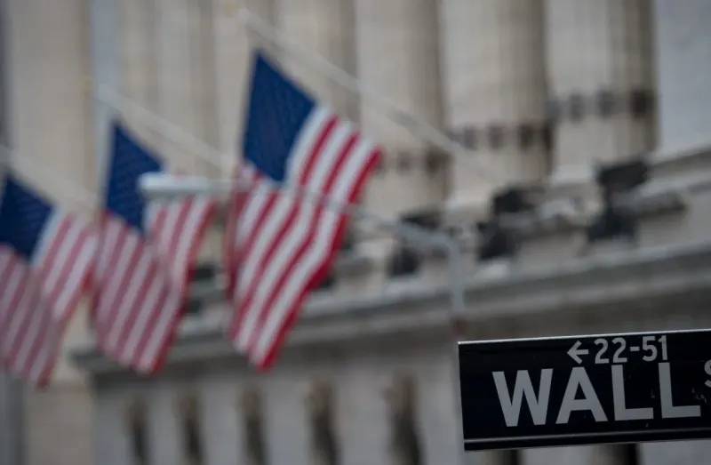 A rate lever lowers a Wall Street bull while lifting a crane and lion, symbolizing Japan and U.K. outperformance.