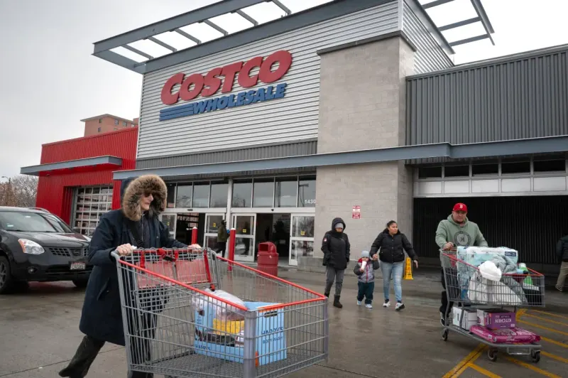 Returned tariff coins tip a warehouse-shaped balance upward, symbolizing Costco’s fourth-quarter profit beat.