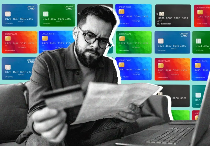A credit card shaped like a shield holds back rising arrows and coins symbolizing higher debt costs.