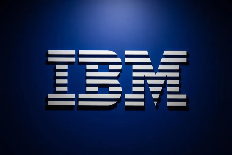 A cracked discount tag reveals a glowing quantum sphere, symbolizing hidden value in IBM’s selloff.