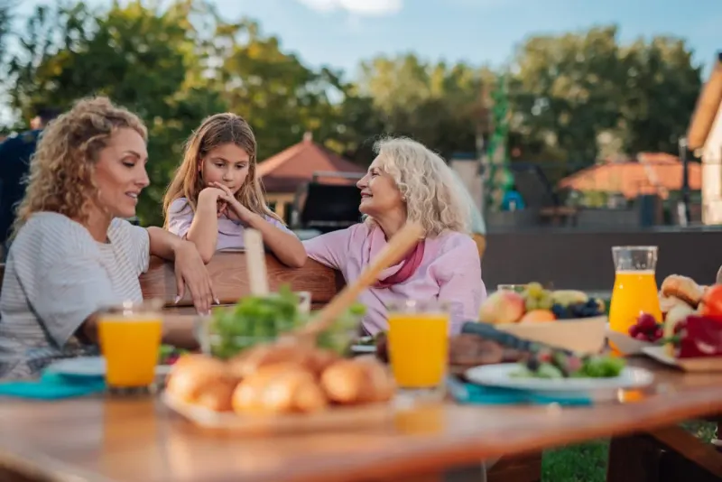 A protected golden nest egg releases smaller eggs toward family nests, symbolizing gifts balanced with retirement security.