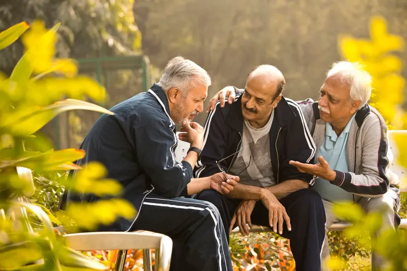A golden retirement egg balances over three paths, symbolizing siblings deciding how to divide an inherited IRA.