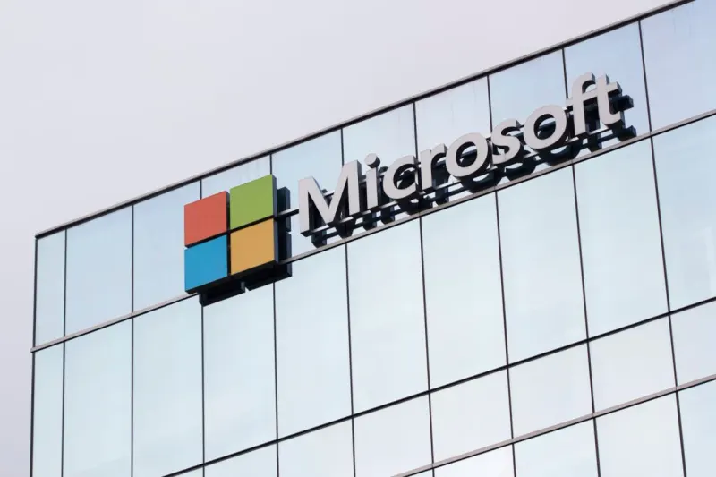 A cloud floats above an iceberg of software tiles, symbolizing Microsoft’s overlooked software revenue potential.