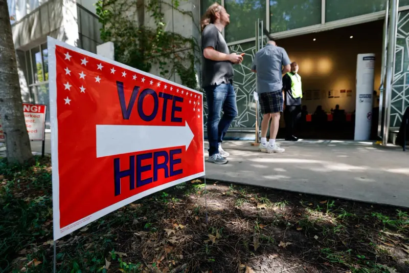 A house-shaped ballot box expands upward as tax coins fall away, symbolizing housing and property-tax measures.
