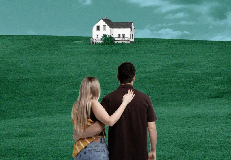 A house-shaped piggy bank sits beyond a widening chasm from coins, symbolizing costly homeownership.