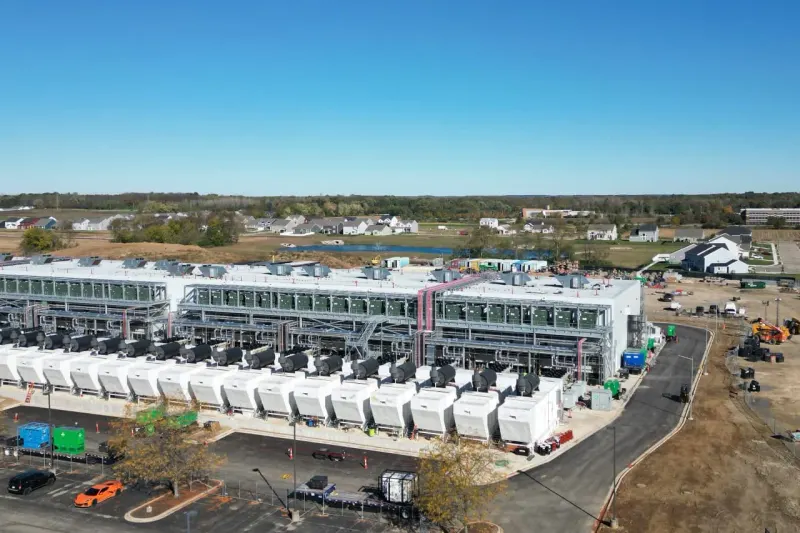 Three server-shaped rockets remain tethered to a launchpad, symbolizing shelved AI data-center flotations.