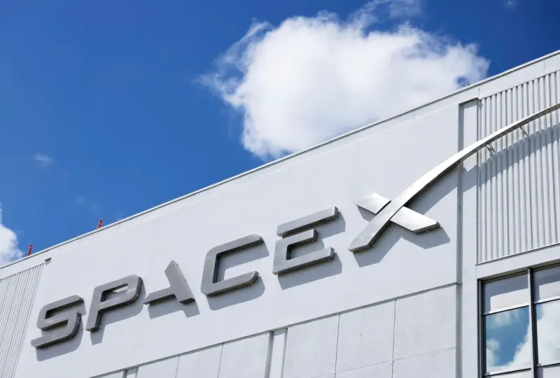 A silicon brain orbits Earth, symbolizing SpaceX's plan for Nvidia-powered AI data centers in space.
