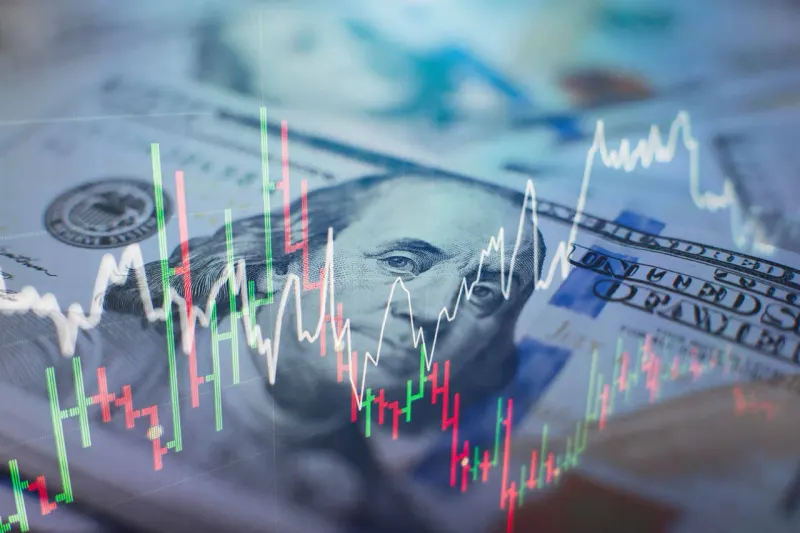 Equity tiles form a protective shield while a bond-shaped shield cracks, symbolizing stocks as a volatility hedge.