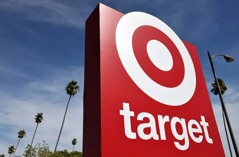 A red shopping basket becomes a snack-filled cornucopia, symbolizing Target’s grocery overhaul.