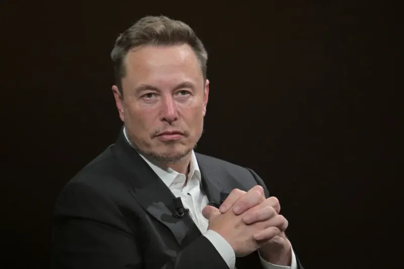 A battery and rocket capsule are pulled toward an uncertain shared orbit, symbolizing the possible Tesla and SpaceX merger.