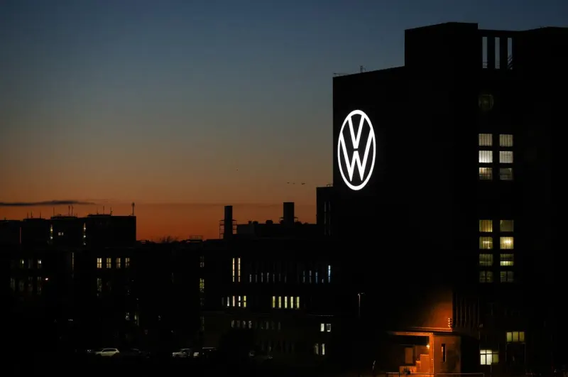 Editorial illustration for: Volkswagen’s stock gets boost from plan to double job cuts to 100,000